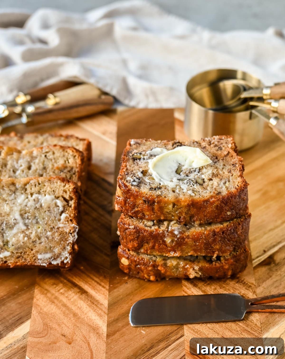 Flour Bakery Irresistible Banana Bread 4 The famous Flour Bakery Banana Bread, highlighting its perfectly golden-brown crust and moist interior, demonstrating why it's a top-rated banana nut bread.