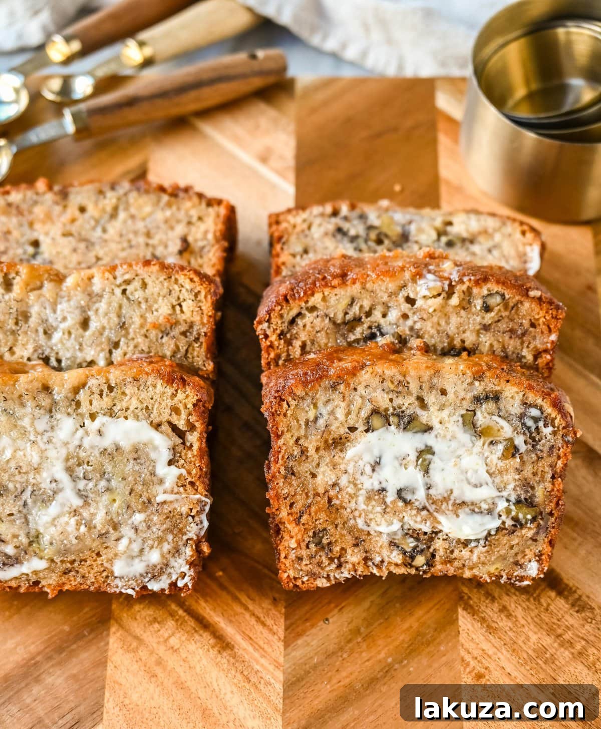 Flour Bakery Irresistible Banana Bread 5 A selection of perfectly ripe bananas, ideal for making the best banana nut bread, showcasing their brown spots and soft texture.