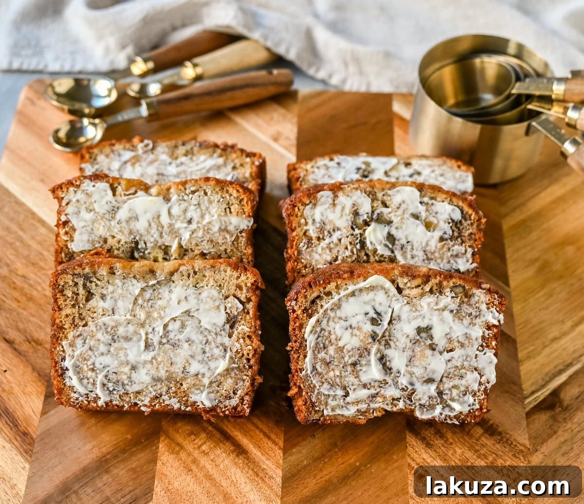 Flour Bakery Irresistible Banana Bread 7 Freshly baked Flour Bakery Banana Bread cooling on a wire rack, ready to be sliced and enjoyed, a perfect example of moist banana nut bread.