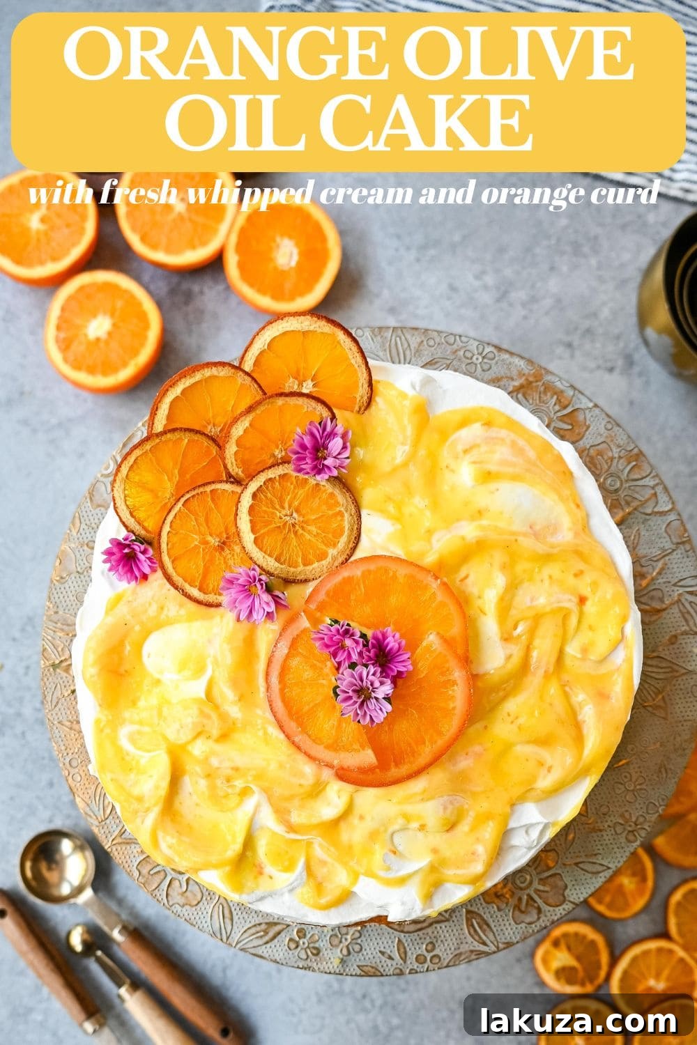 Beautifully plated Orange Olive Oil Cake slice with whipped cream, orange curd, and dried orange
