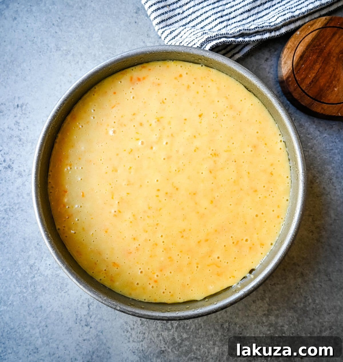 Orange Olive Oil Cake batter in a prepared pan