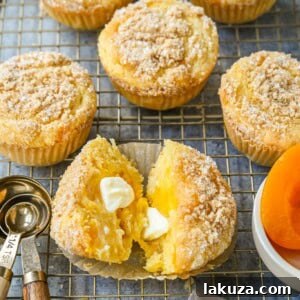 Delicious Peach Cobbler Muffins with streusel topping.