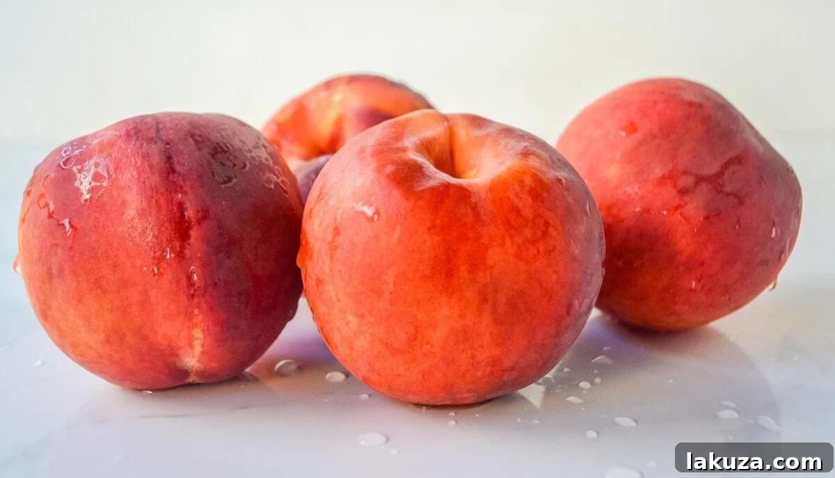Close-up of fresh, ripe peaches, ready for baking.