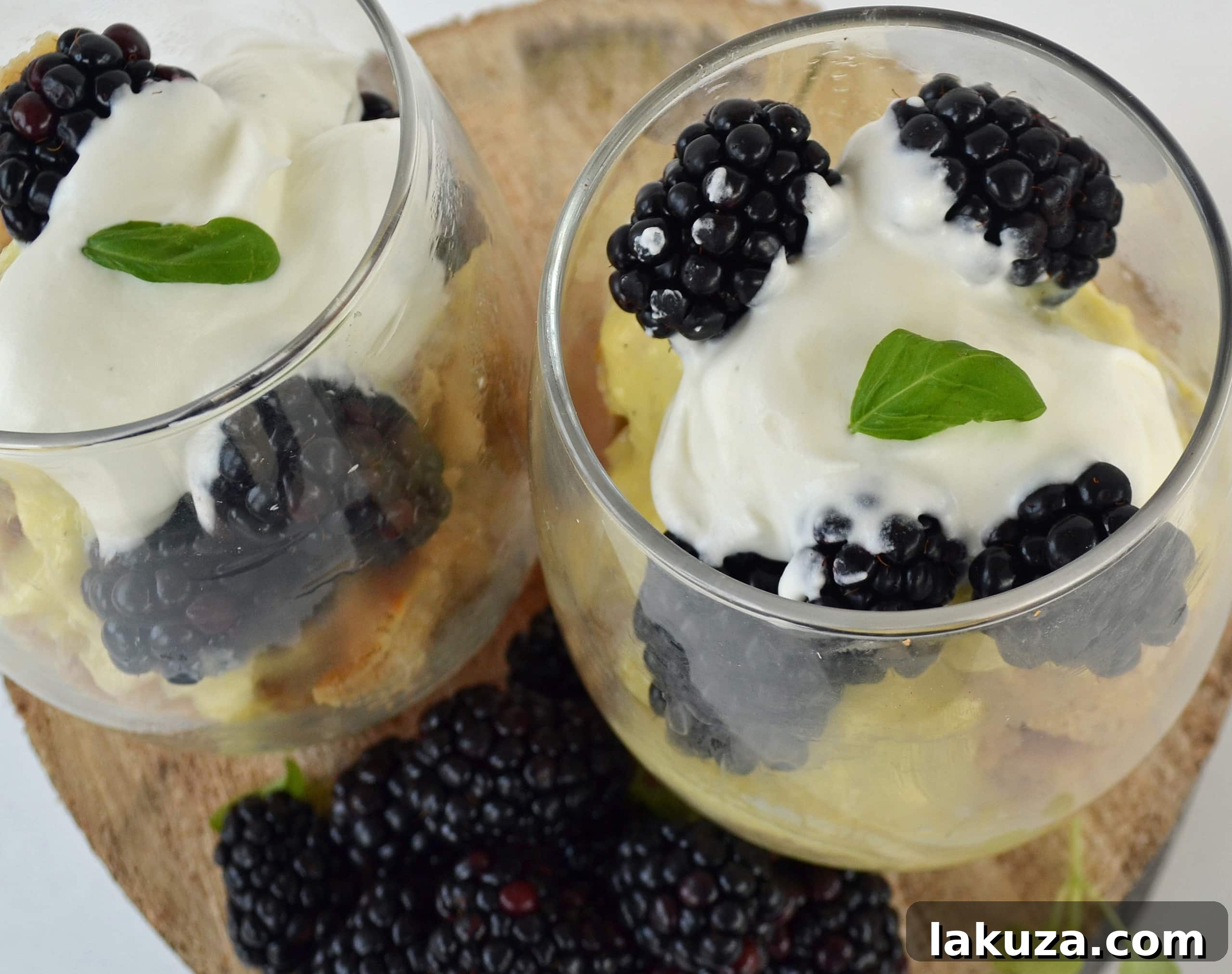 Decadent Blackberry Bread Pudding 3 Blackberry Creme Bread Pudding, a decadent dessert featuring a rich custard base, sweet blackberries, and a luxurious creme anglaise topping.