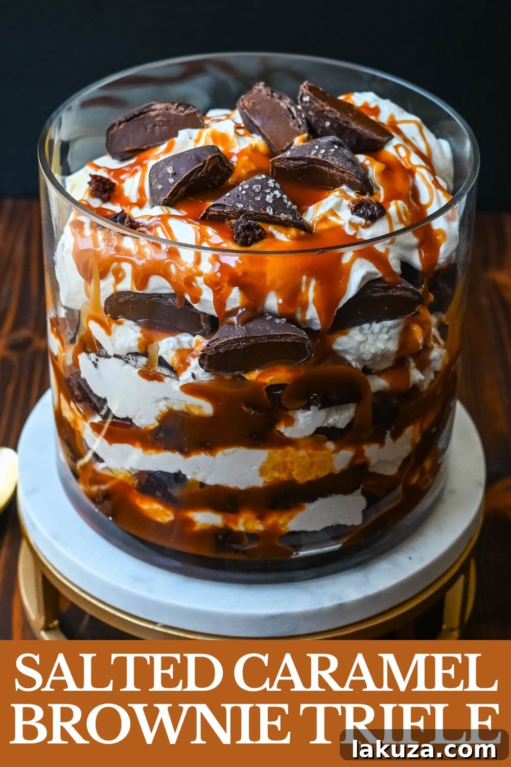 This Salted Caramel Brownie Cheesecake Trifle is made layers of rich, fudgy brownies, creamy cheesecake filling, salted caramel, homemade whipped cream, and chocolate covered caramels. This is the perfect sweet dessert to impress your guests and is such a crowd pleaser!