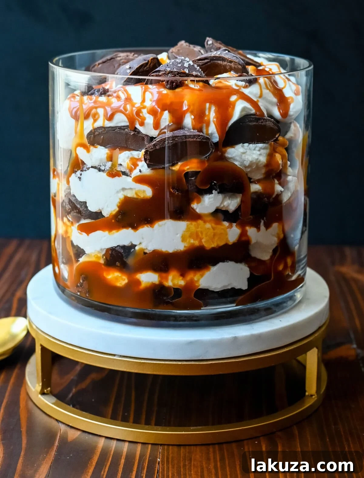 This Salted Caramel Brownie Cheesecake Trifle is made layers of rich, fudgy brownies, creamy cheesecake filling, salted caramel, homemade whipped cream, and chocolate covered caramels. This is the perfect sweet dessert to impress your guests and is such a crowd pleaser!