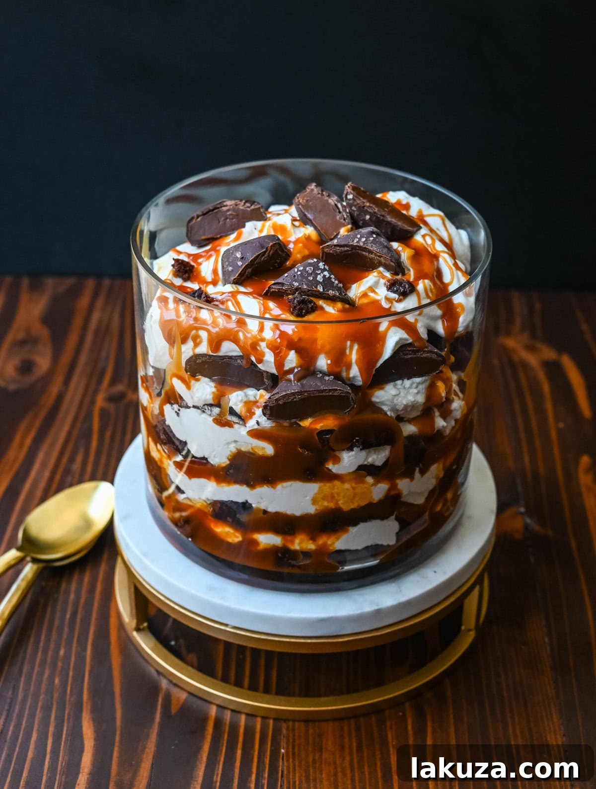 This Salted Caramel Brownie Cheesecake Trifle is made layers of rich, fudgy brownies, creamy cheesecake filling, salted caramel, homemade whipped cream, and chocolate covered caramels. This is the perfect sweet dessert to impress your guests and is such a crowd pleaser!