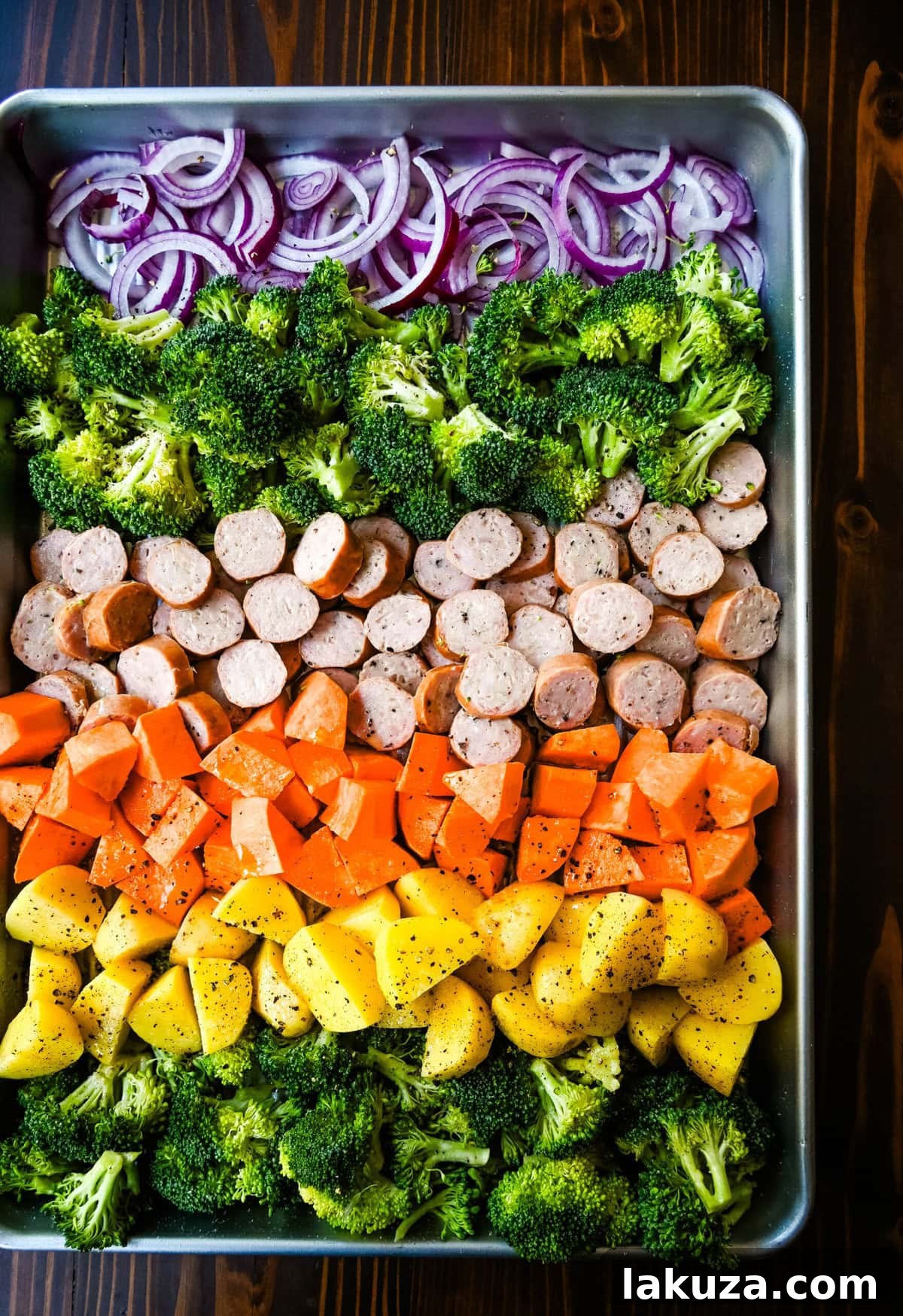Effortless Sheet Pan Chicken Sausage and Roasted Vegetables 4 This Sheet Pan Chicken Sausage and Veggies Recipe is made with savory chicken sausage nestled between caramelized, crispy-edged vegetables, all roasted to perfection on a single sheet pan. It's quick, effortless, so delicious, and perfect for busy weeknights or cozy, family-style dinners.