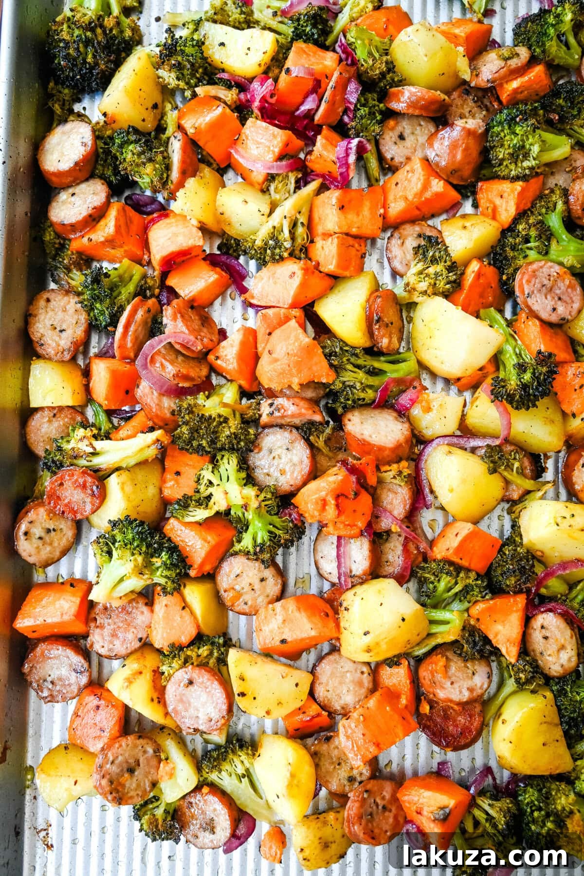 Effortless Sheet Pan Chicken Sausage and Roasted Vegetables 6 This Sheet Pan Chicken Sausage and Veggies Recipe is made with savory chicken sausage nestled between caramelized, crispy-edged vegetables, all roasted to perfection on a single sheet pan. It's quick, effortless, so delicious, and perfect for busy weeknights or cozy, family-style dinners.