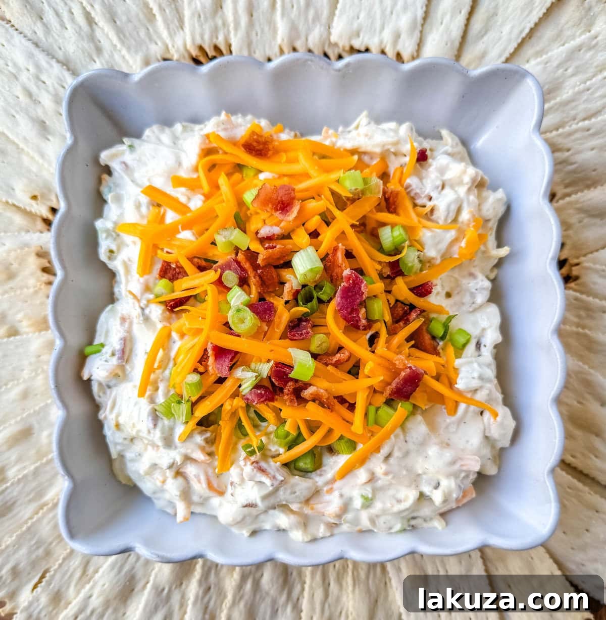 Crack Dip, also known as Million Dollar Dip, is a creamy, addictive party favorite made with a few simple and flavorful ingredients. The combination of cream cheese, cheddar, parmesan, bacon, ranch seasoning, and even jalapenos creates a combo that people can’t stop eating, which explains its catchy nickname—Crack Dip. Whether you're hosting a game night, family gathering, or looking for an easy, crowd-pleasing snack, this dip is bound to be a hit. 