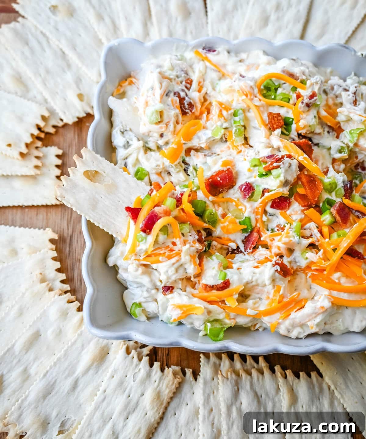 Crack Dip, also known as Million Dollar Dip, is a creamy, addictive party favorite made with a few simple and flavorful ingredients. The combination of cream cheese, cheddar, parmesan, bacon, ranch seasoning, and even jalapenos creates a combo that people can’t stop eating, which explains its catchy nickname—Crack Dip. Whether you're hosting a game night, family gathering, or looking for an easy, crowd-pleasing snack, this dip is bound to be a hit.