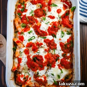 Hearty Baked Italian Sausage Rigatoni 8 Baked Rigatoni with Sausage: A comforting Italian pasta dish with savory sausage, rich tomato sauce, and gooey cheese, perfect for family dinners.