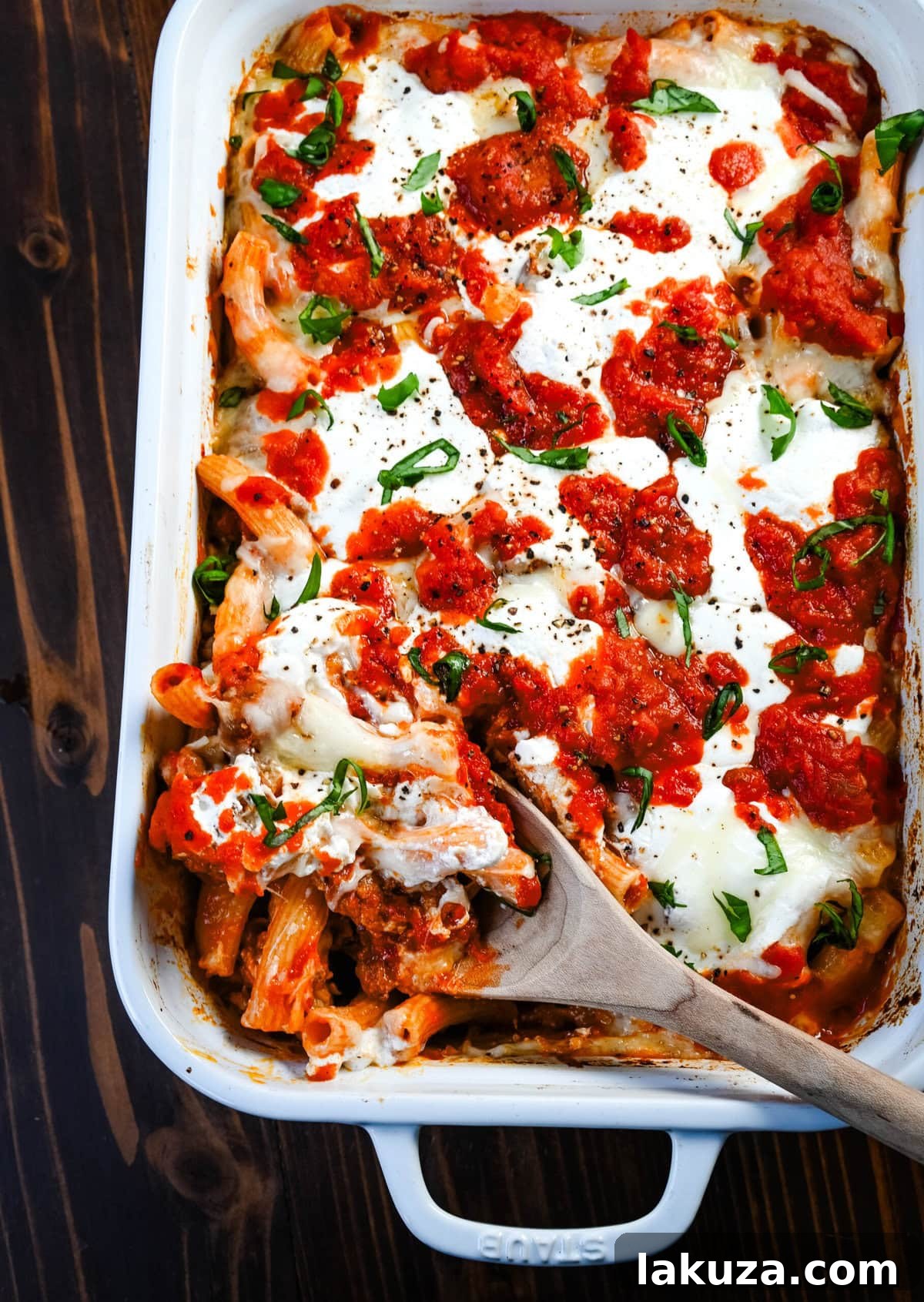 Hearty Baked Italian Sausage Rigatoni 3 Close-up of baked rigatoni with sausage, showing melted cheese and rich sauce.