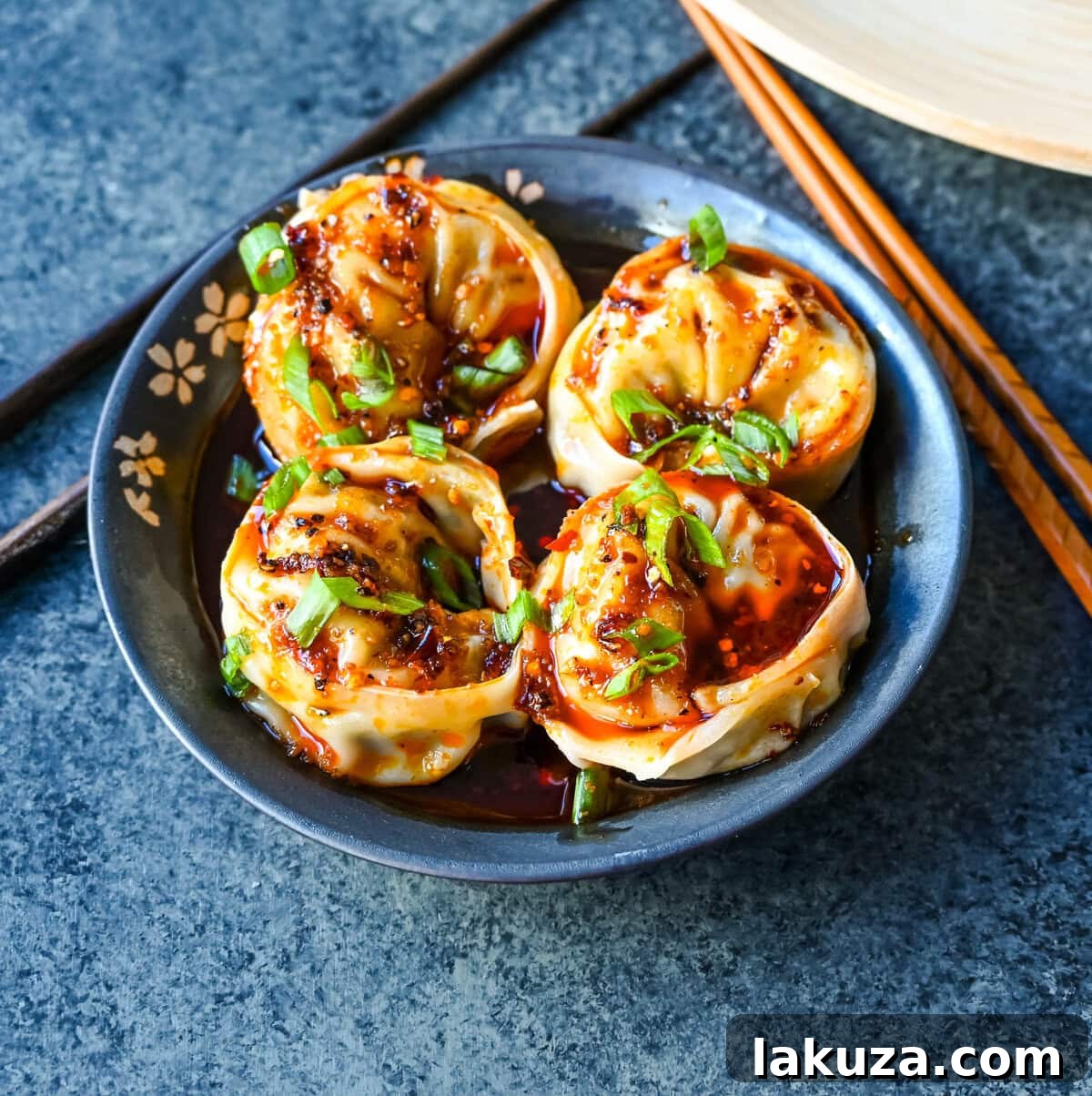 Spicy Chili Wonton Delight 5 Spicy Wonton Dumplings with Spicy Chili Sauce. How to make the perfect spicy, sweet, and tangy homemade chili sauce to toss on wontons or dumplings for a quick and easy meal. This recipe is reminiscent of the spicy wontons you will find at Din Tai Fung.