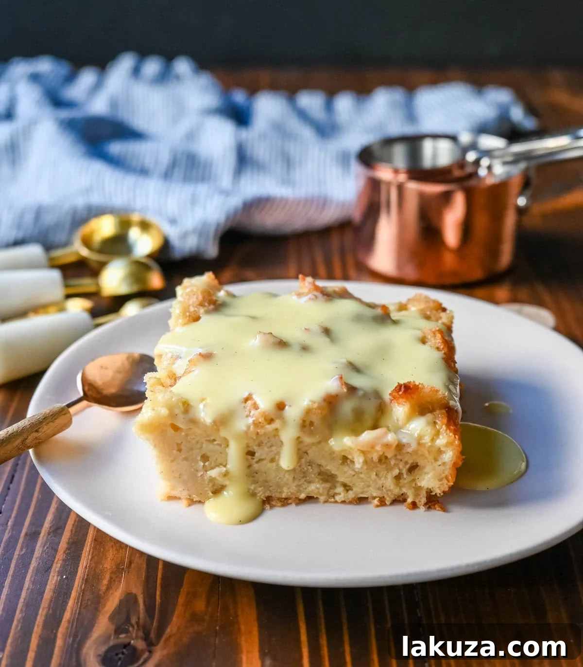 The best bread pudding recipe, an ultimate comfort dessert, featuring smooth vanilla bean custard absorbed by rich, day-old bread. Enhanced with warm spices and vanilla for creamy texture, topped with a crisp, golden crust. Served with homemade creme anglaise sauce and fresh whipped cream, it's the perfect comfort food dessert!