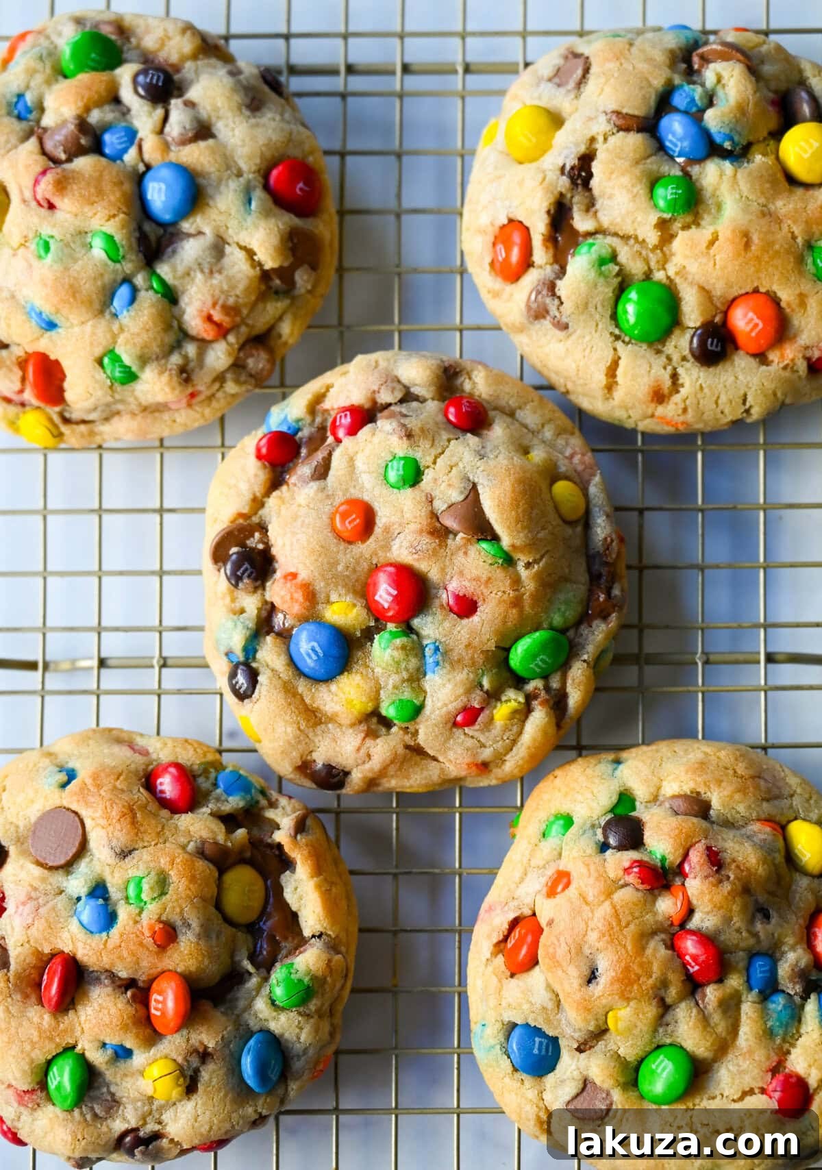 M&M Nutella Volcano Cookies 3 A close-up of a warm M&M Nutella Lava Cookie, cut open to reveal its molten Nutella center.