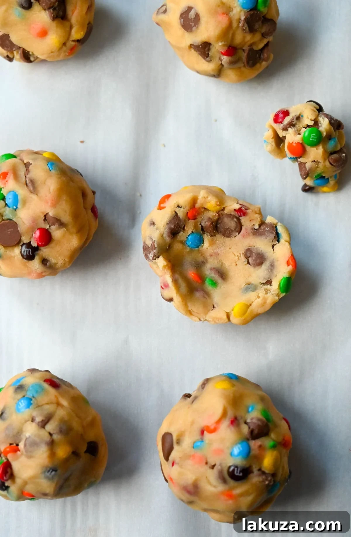 M&M Nutella Volcano Cookies 7 A flattened M&M Nutella Lava cookie dough ball ready to be stuffed with Nutella.