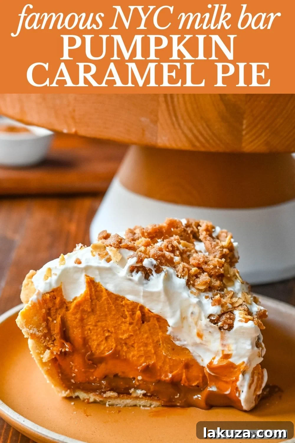 Golden Harvest Hillys Pumpkin Caramel Pie 16 A stunning side view of a tall, multi-layered slice of Milk Bar Pumpkin Caramel Pie.