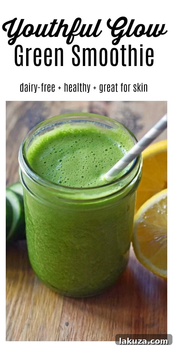 Youthful Glow Green Smoothie. Healthy light and fresh smoothie with greens. Spinach, lemon juice, cucumber, ginger, and banana.