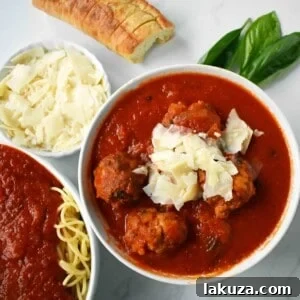 Mama's Best Ever Spaghetti and Meatballs by Modern Honey. Homemade meatballs made from scratch. Authentic Italian meatballs and marinara sauce.