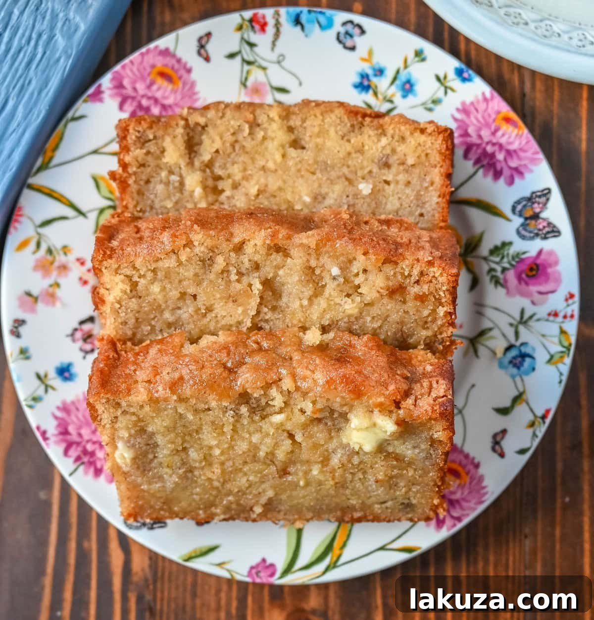Ultimate Banana Bread Perfection 7 Slice of moist banana bread with a rich, caramelized brown sugar topping.