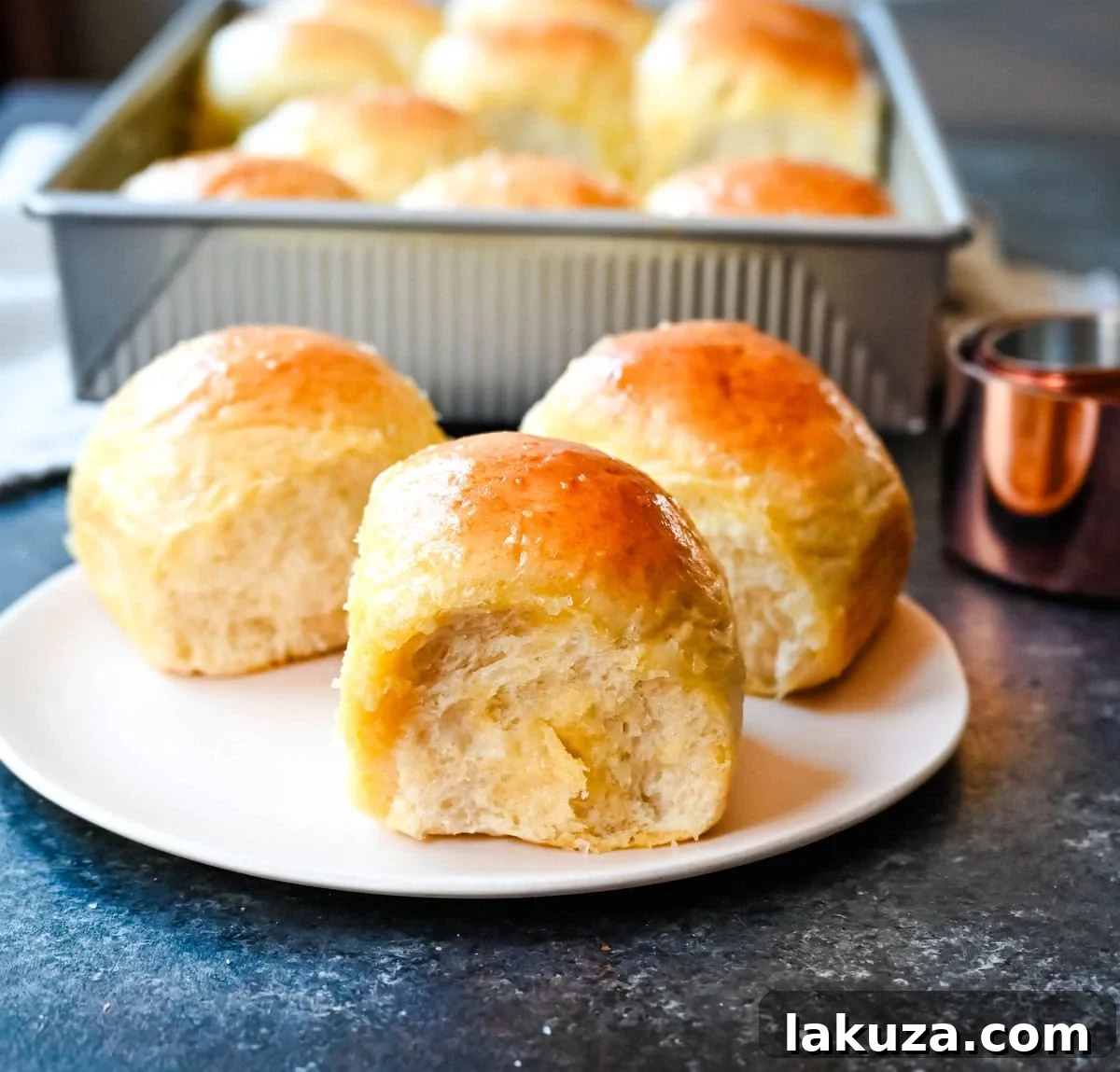 Pillowy Japanese Milk Buns 2 Japanese Milk Bread Dinner Rolls: Incredibly soft, fluffy, and tender homemade rolls achieved through the unique tangzhong technique, making them melt-in-your-mouth delicious.
