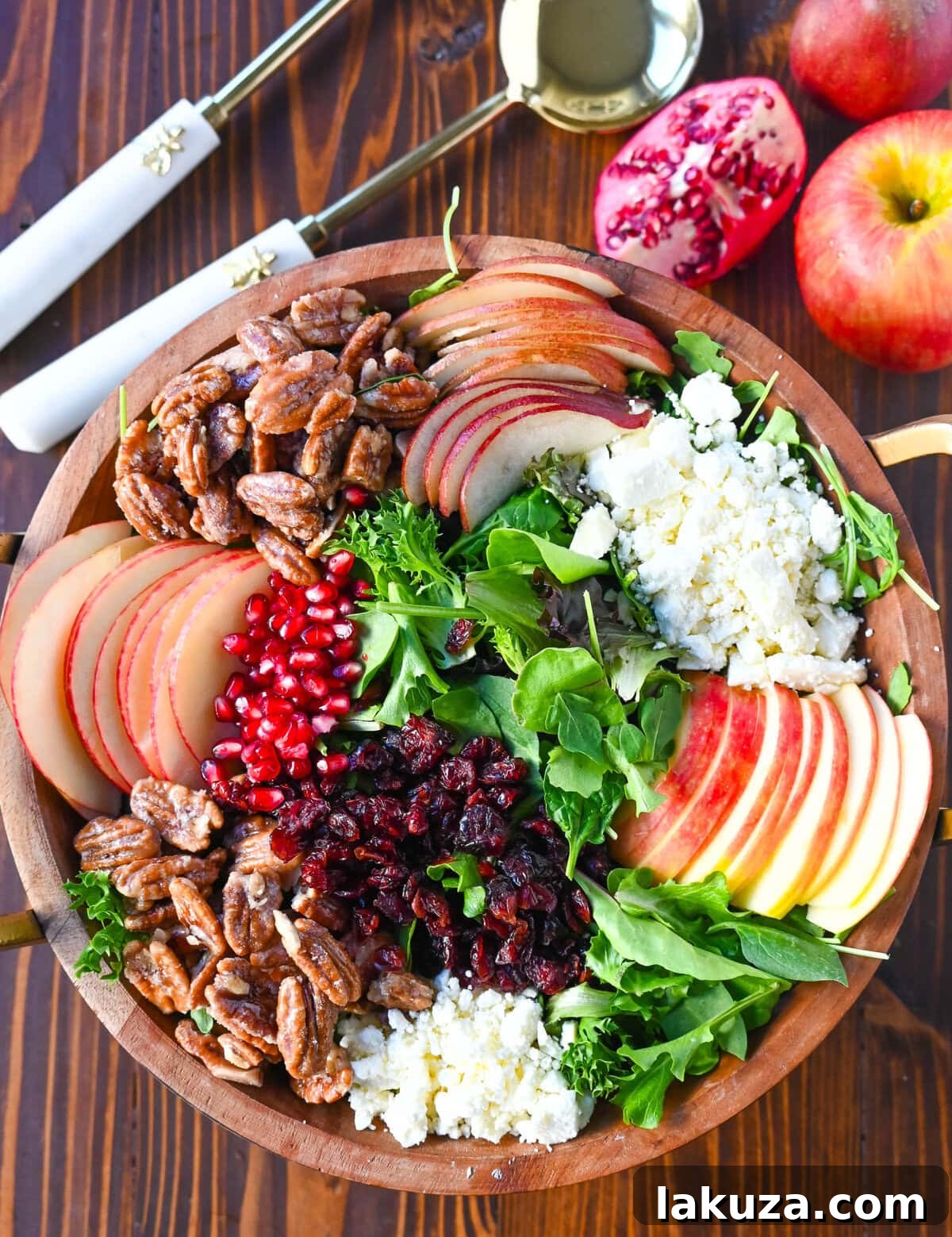 A vibrant Honeycrisp Apple and Candied Pecan Salad, perfect for autumn, Fall, and Thanksgiving gatherings. Features crisp apples, creamy goat cheese, sweet pecans, and a tangy maple dressing.