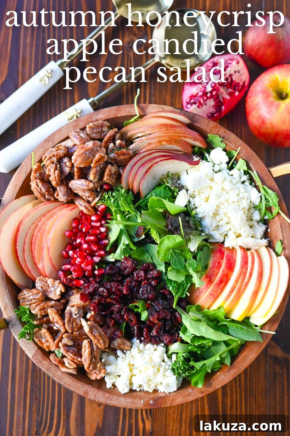 A visually stunning Honeycrisp Apple and Candied Pecan Salad, ideal for autumn, Fall, and Thanksgiving gatherings. This seasonal salad combines crisp fruits, creamy goat cheese, sweet and crunchy candied pecans, and a tangy homemade maple dressing to highlight the best of the season.