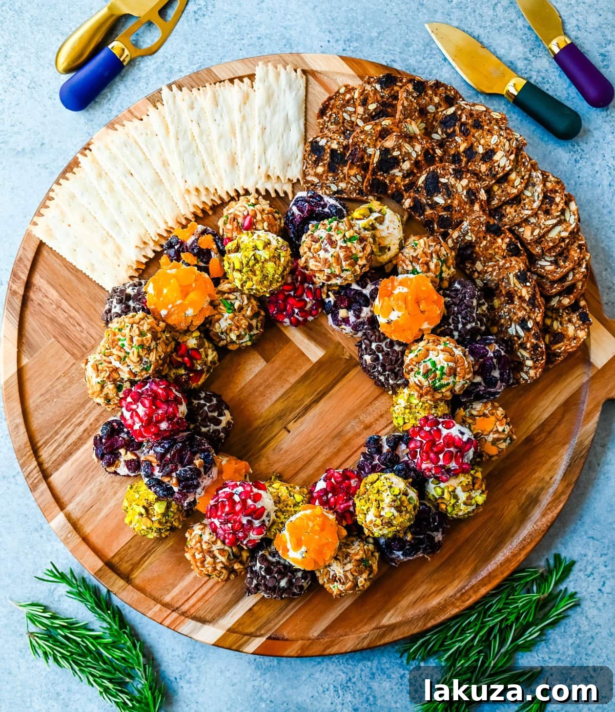 Irresistible Mini Cheese Bites 11 A beautiful arrangement of mini cheese balls, featuring various savory and sweet options, on a festive holiday platter.