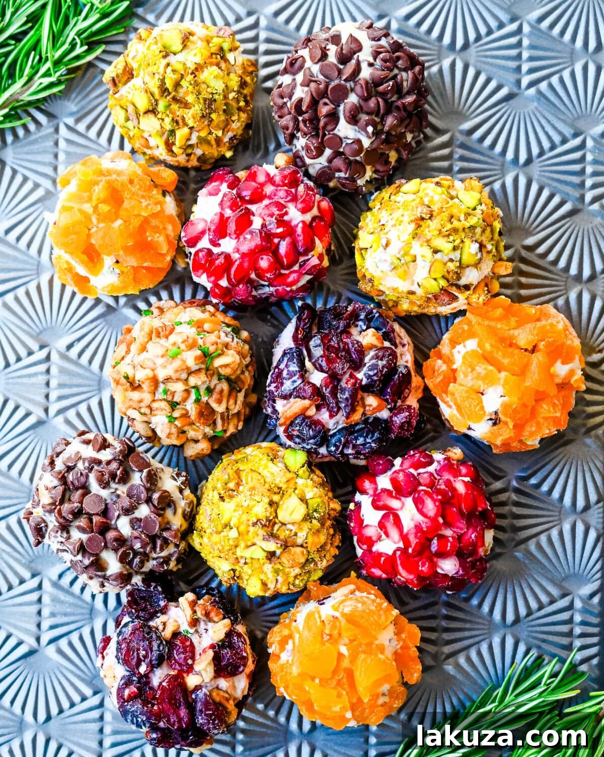 Irresistible Mini Cheese Bites 10 Homemade Mini Cheese Balls, decorated with various toppings, displayed beautifully as a holiday appetizer on a serving platter.