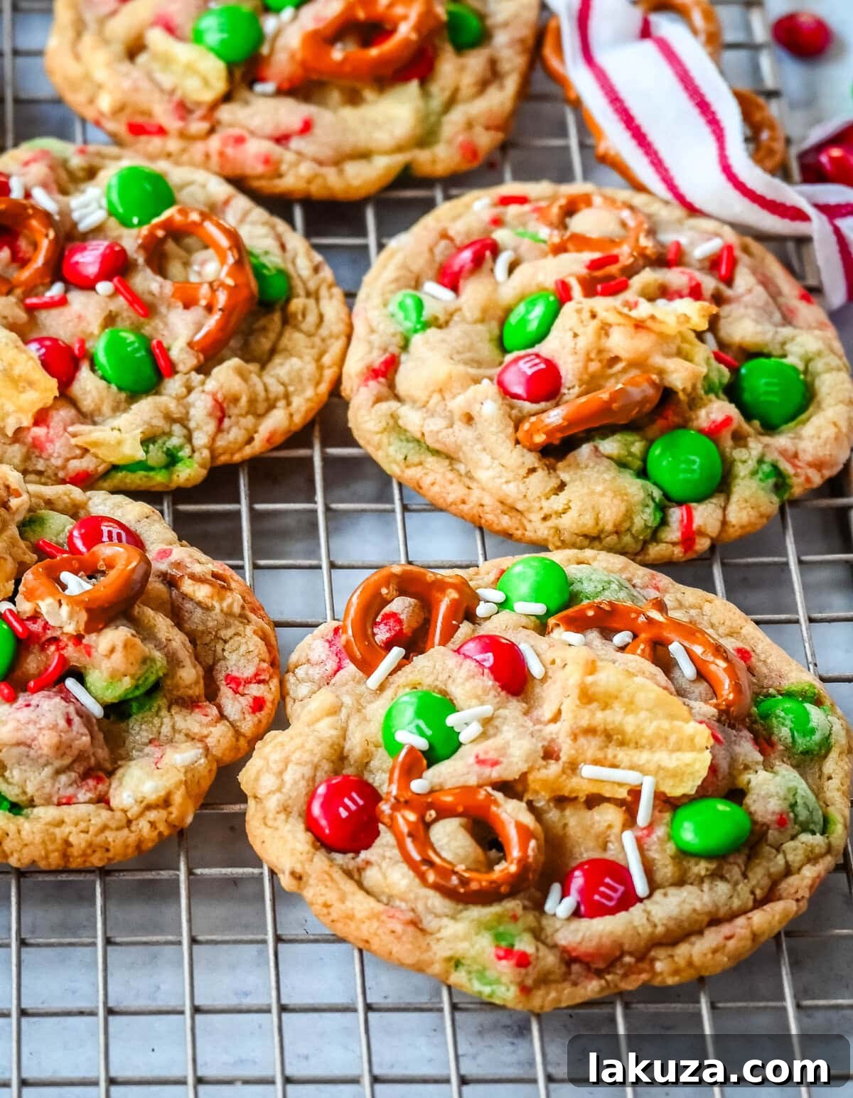 Christmas Cornucopia Cookies 5 Get ready to bake the ultimate Christmas treat with these Christmas Kitchen Sink Cookies! Packed with holiday M&M's, pretzels, potato chips, sprinkles, and optional chocolate chips, these cookies bring together sweet, salty, and festive flavors in every bite. They're easy to make, fun to customize, and perfect for gifting, cookie swaps, and for your Christmas baking.