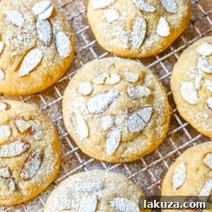 Almond Croissant-Inspired Cookies 10 Almond Croissant Cookies, a buttery and flaky treat with homemade almond filling.