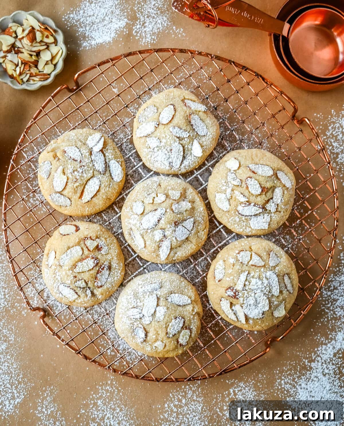 Almond Croissant-Inspired Cookies 8 Freshly baked Almond Croissant Cookies cooling on a wire rack.