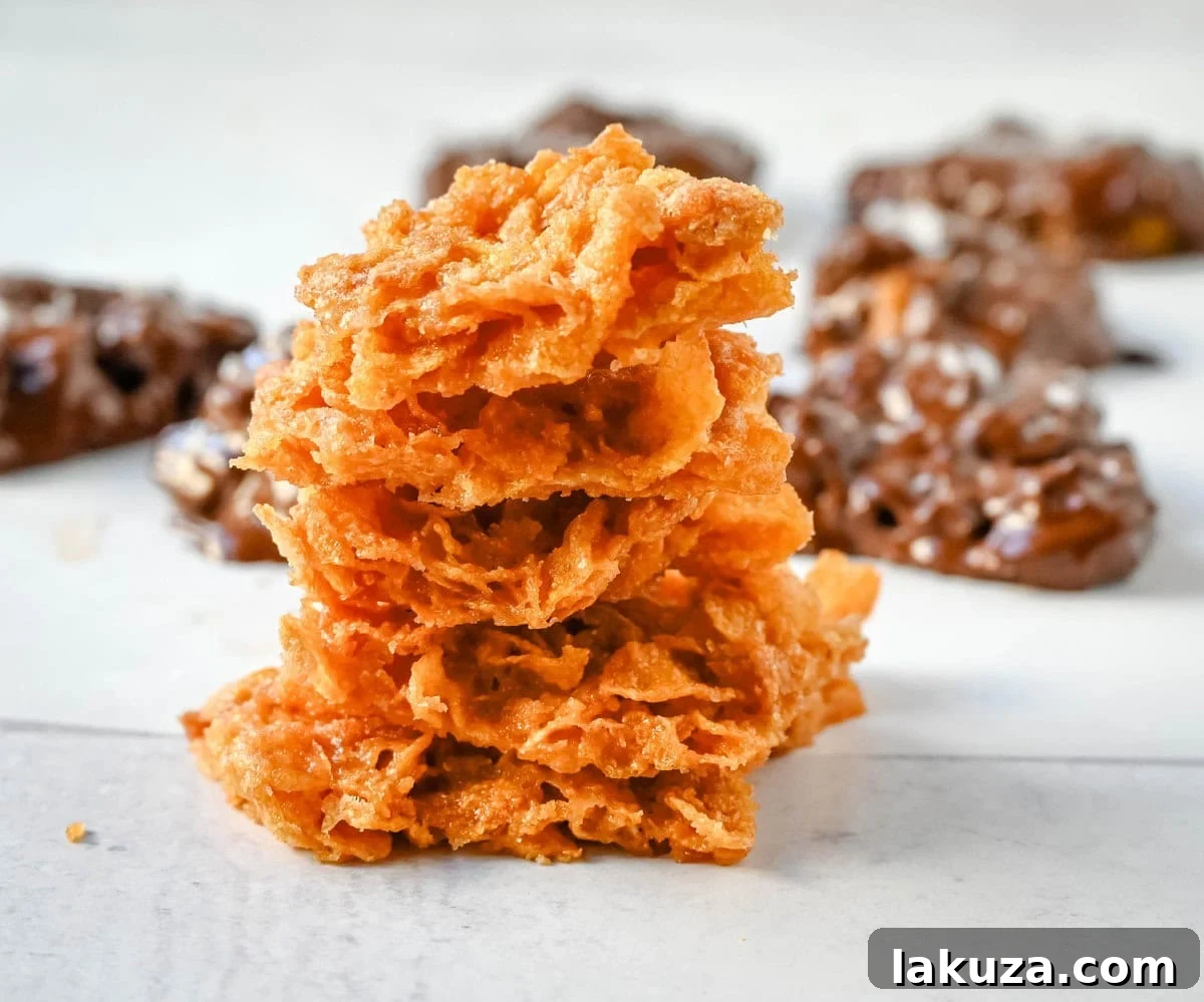 Baked Cornflake Crack cooling on a baking sheet, showcasing its golden caramelization before being broken into pieces.