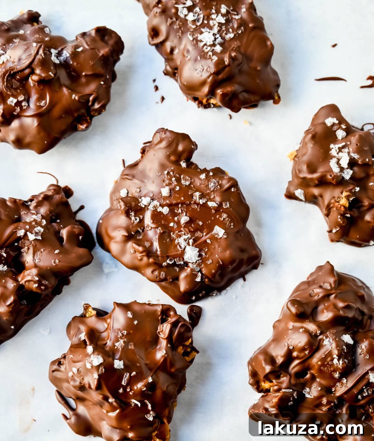 Platter of Chocolate Covered Cornflake Crack, highlighting the delicious contrast between the golden cereal and the dark chocolate.
