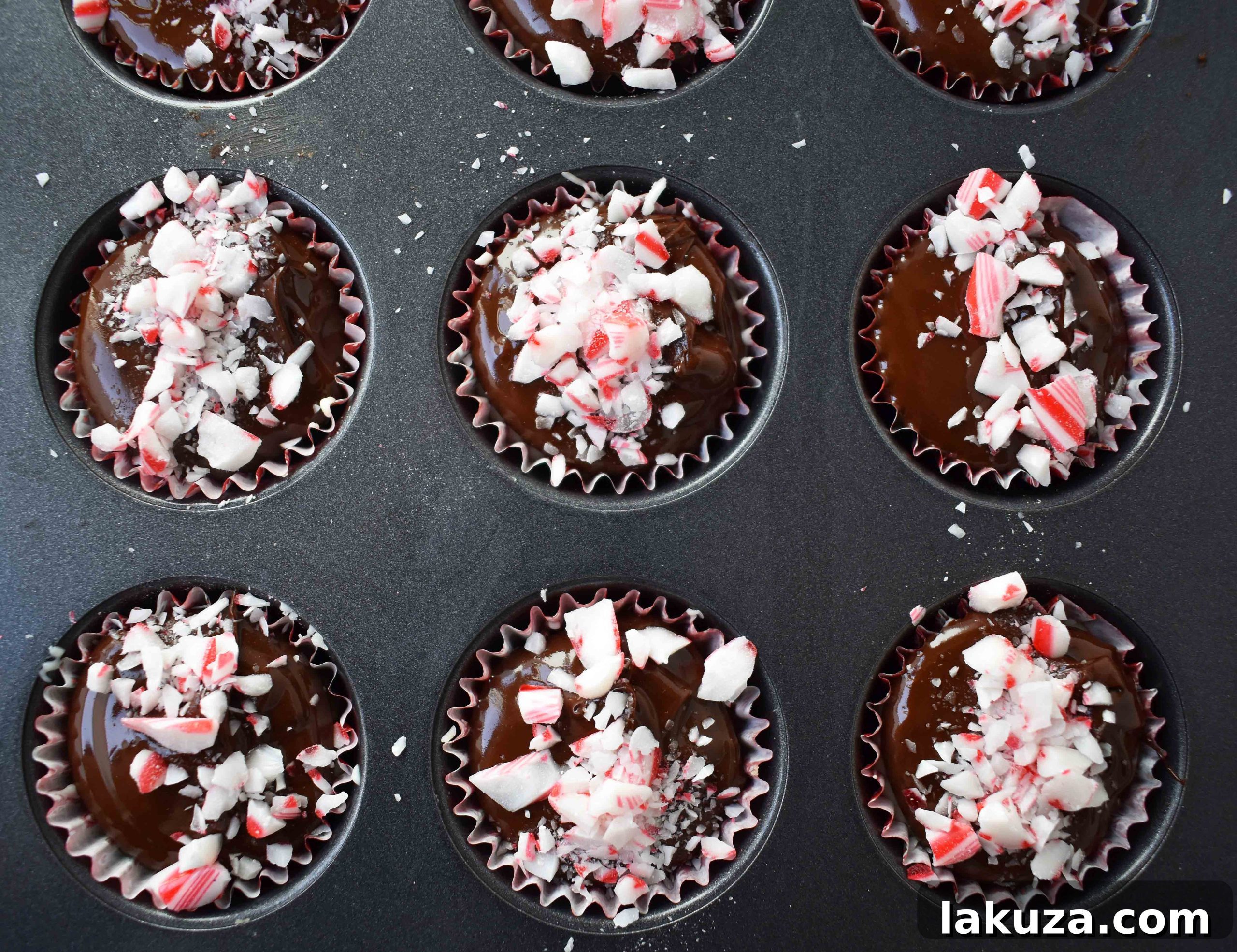 A close-up of melted white chocolate being prepared, showcasing its smooth and glossy texture, ready for layering.