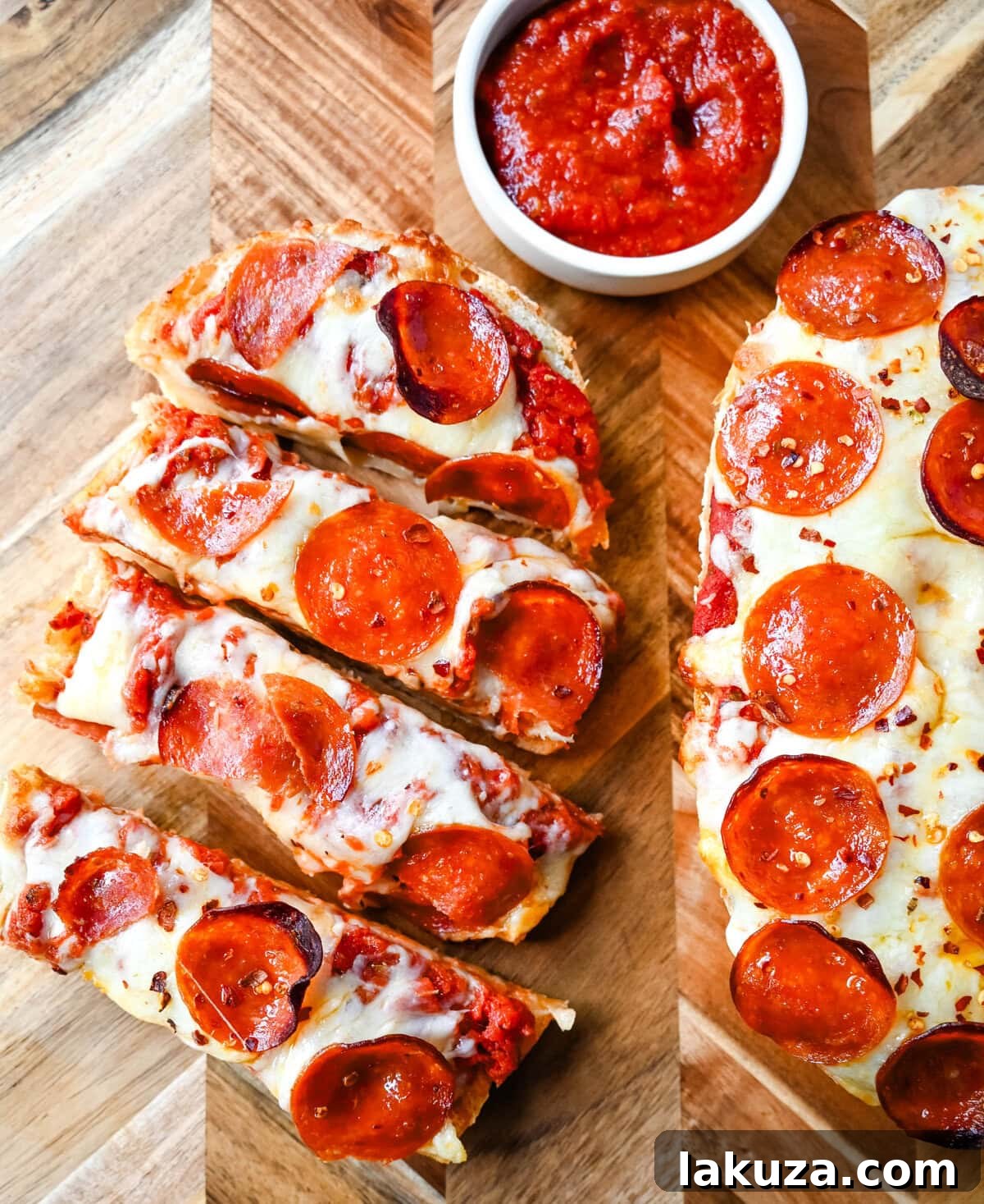 Crispy French Bread Pizzas 8 Individual slices of French bread pizza, neatly packaged in an airtight container for storage or freezing.