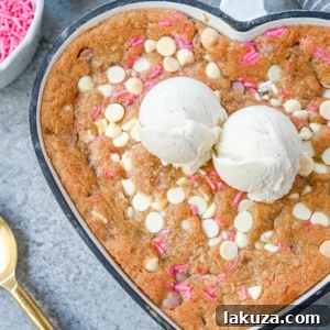 Valentine's Sweetheart Skillet Cookie 8 Valentine's Day Heart Skillet Cookie. Soft, chewy skillet cookie recipe filled with white chocolate chips, pink sprinkles, and any of your favorite festive additions such as Valentine's Day M&M's and ruby chocolate. Top it with vanilla ice cream and have the perfect Valentine's Day dessert.