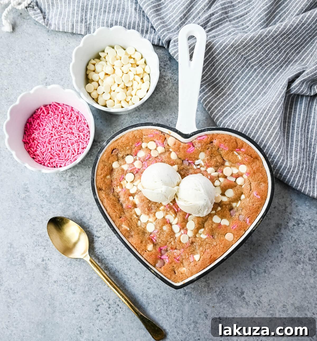 Valentine's Sweetheart Skillet Cookie 3 Valentine's Day Heart Skillet Cookie. Soft, chewy skillet cookie recipe filled with white chocolate chips, pink sprinkles, and any of your favorite festive additions such as Valentine's Day M&M's and ruby chocolate. Top it with vanilla ice cream and have the perfect Valentine's Day dessert.