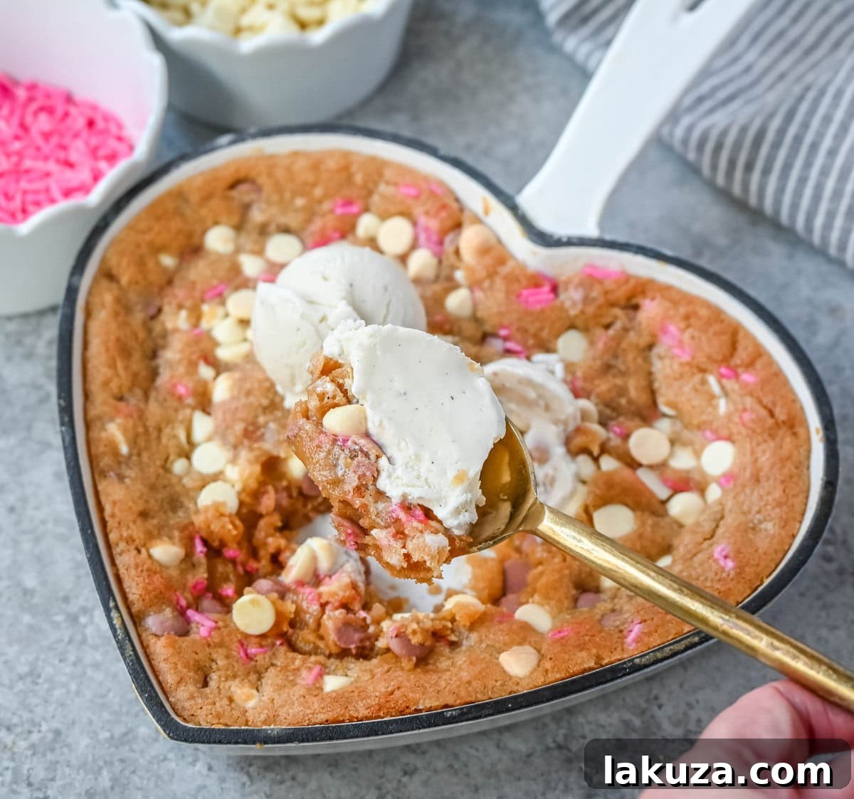 Valentine's Sweetheart Skillet Cookie 5 Valentine's Day Heart Skillet Cookie. Soft, chewy skillet cookie recipe filled with white chocolate chips, pink sprinkles, and any of your favorite festive additions such as Valentine's Day M&M's and ruby chocolate. Top it with vanilla ice cream and have the perfect Valentine's Day dessert.