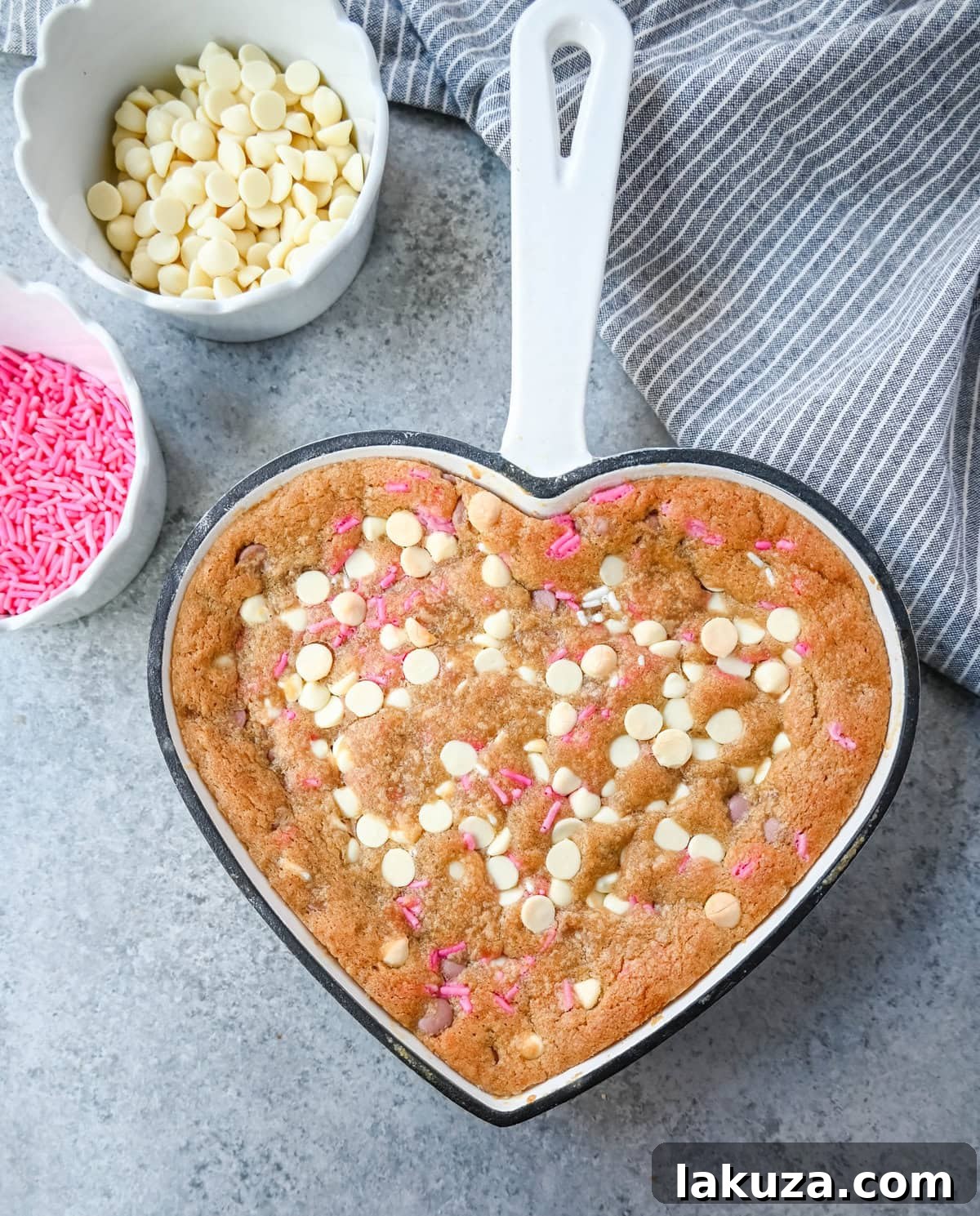 Valentine's Sweetheart Skillet Cookie 6 Valentine's Day Heart Skillet Cookie. Soft, chewy skillet cookie recipe filled with white chocolate chips, pink sprinkles, and any of your favorite festive additions such as Valentine's Day M&M's and ruby chocolate. Top it with vanilla ice cream and have the perfect Valentine's Day dessert.
