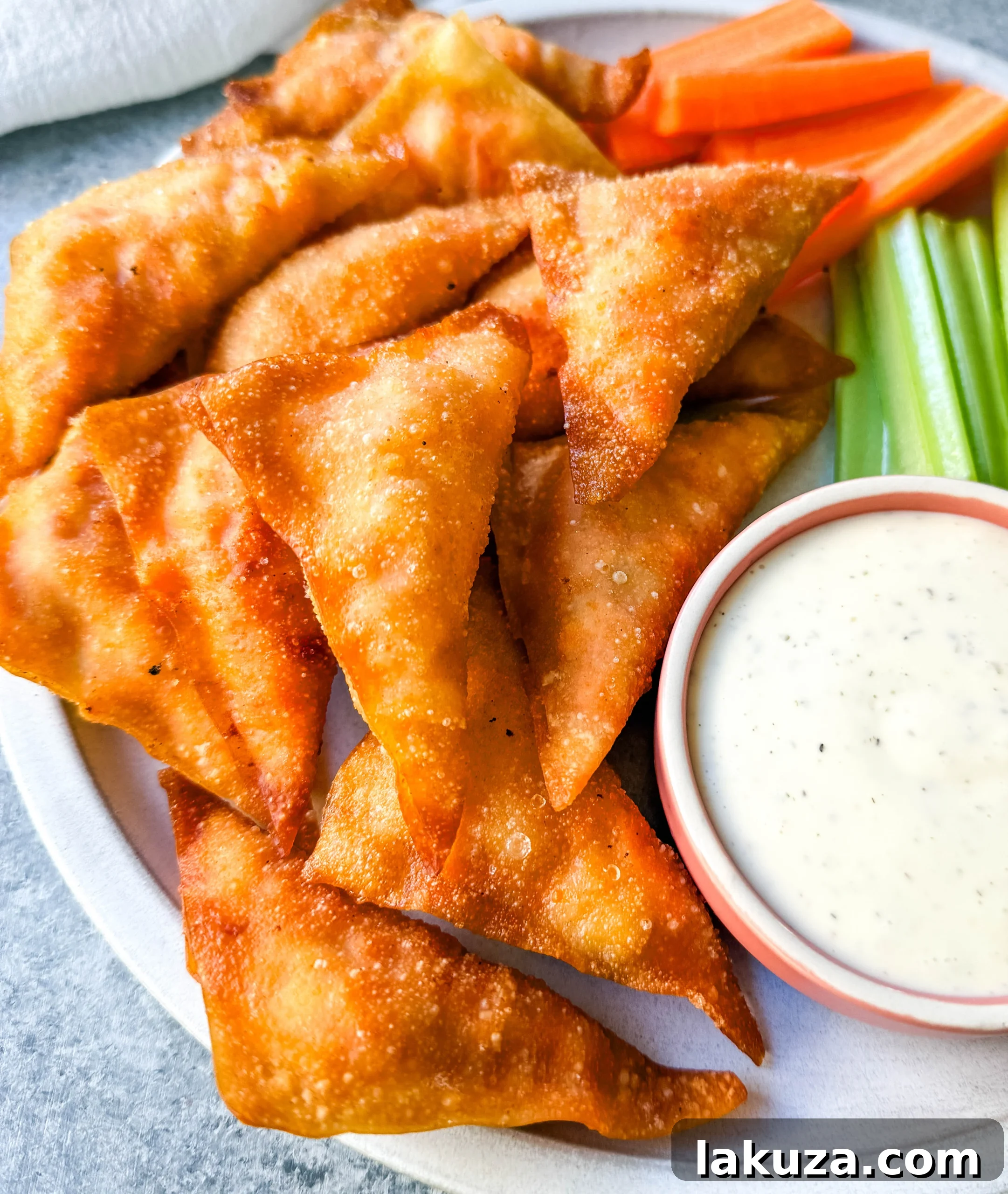 The Cheesecake Factory Signature Buffalo Blasts 3 Buffalo Blasts are a crispy, spicy, and flavorful appetizer that combines tangy buffalo chicken and cheese in golden fried pockets. These bite-size appetizers made with a blend of melted cheese, tender chicken, and zesty buffalo sauce, are wrapped in wonton wrappers and fried to golden perfection. These popular Cheesecake Factory Buffalo Blasts are a super popular appetizer.
