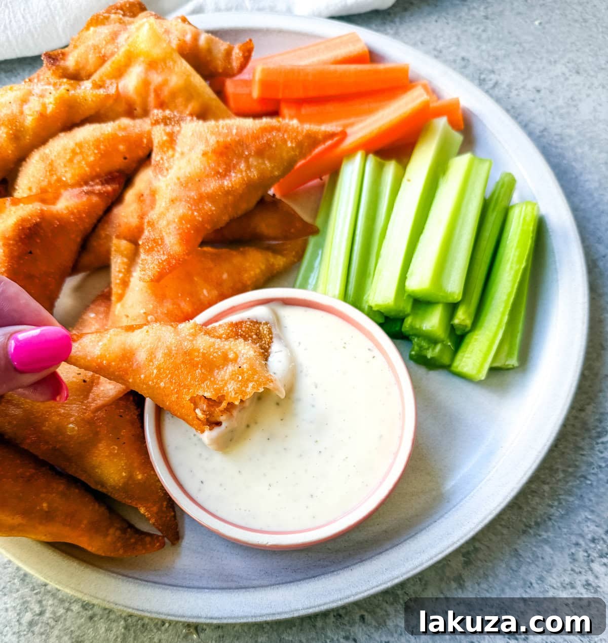 The Cheesecake Factory Signature Buffalo Blasts 4 Buffalo Blasts are a crispy, spicy, and flavorful appetizer that combines tangy buffalo chicken and cheese in golden fried pockets. These bite-size appetizers made with a blend of melted cheese, tender chicken, and zesty buffalo sauce, are wrapped in wonton wrappers and fried to golden perfection. These popular Cheesecake Factory Buffalo Blasts are a super popular appetizer.