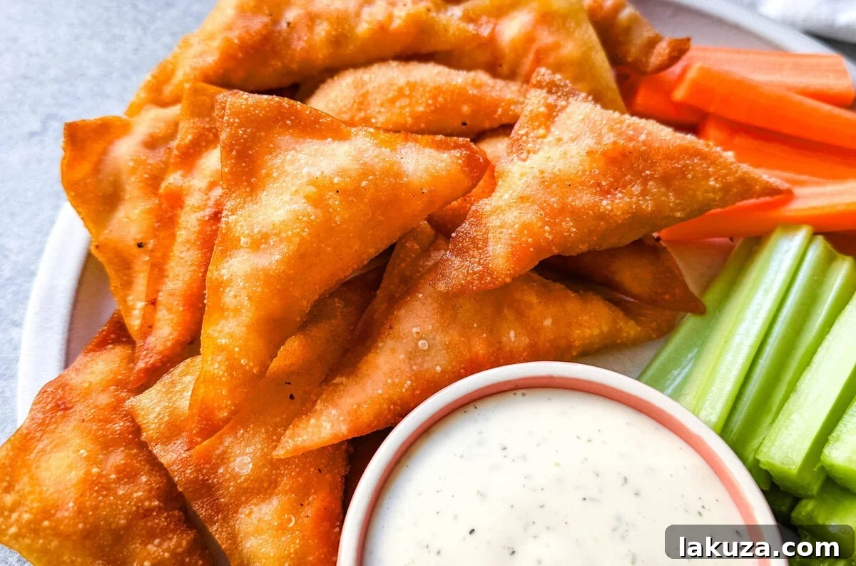 The Cheesecake Factory Signature Buffalo Blasts 5 Buffalo Blasts are a crispy, spicy, and flavorful appetizer that combines tangy buffalo chicken and cheese in golden fried pockets. These bite-size appetizers made with a blend of melted cheese, tender chicken, and zesty buffalo sauce, are wrapped in wonton wrappers and fried to golden perfection. These popular Cheesecake Factory Buffalo Blasts are a super popular appetizer.