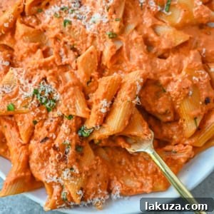 Penne alla Vodka is a classic Italian-American dish featuring a rich, creamy tomato sauce with a touch of vodka. While the alcohol cooks off, the vodka adds a subtle depth and brightness that sets this recipe apart from a standard marinara or tomato cream sauce. You will love this Love at First Bite Pasta!