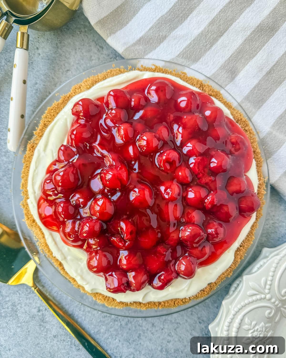 Dreamy No-Bake Cheesecake with Sweetened Condensed Milk 5 The assembled No-Bake Cheesecake, covered with plastic wrap and ready for chilling in the refrigerator.