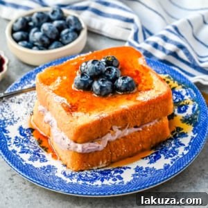Decadent Blueberry Cheesecake French Toast 10 Blueberry Cheesecake Stuffed French Toast, a delightful breakfast or brunch recipe.