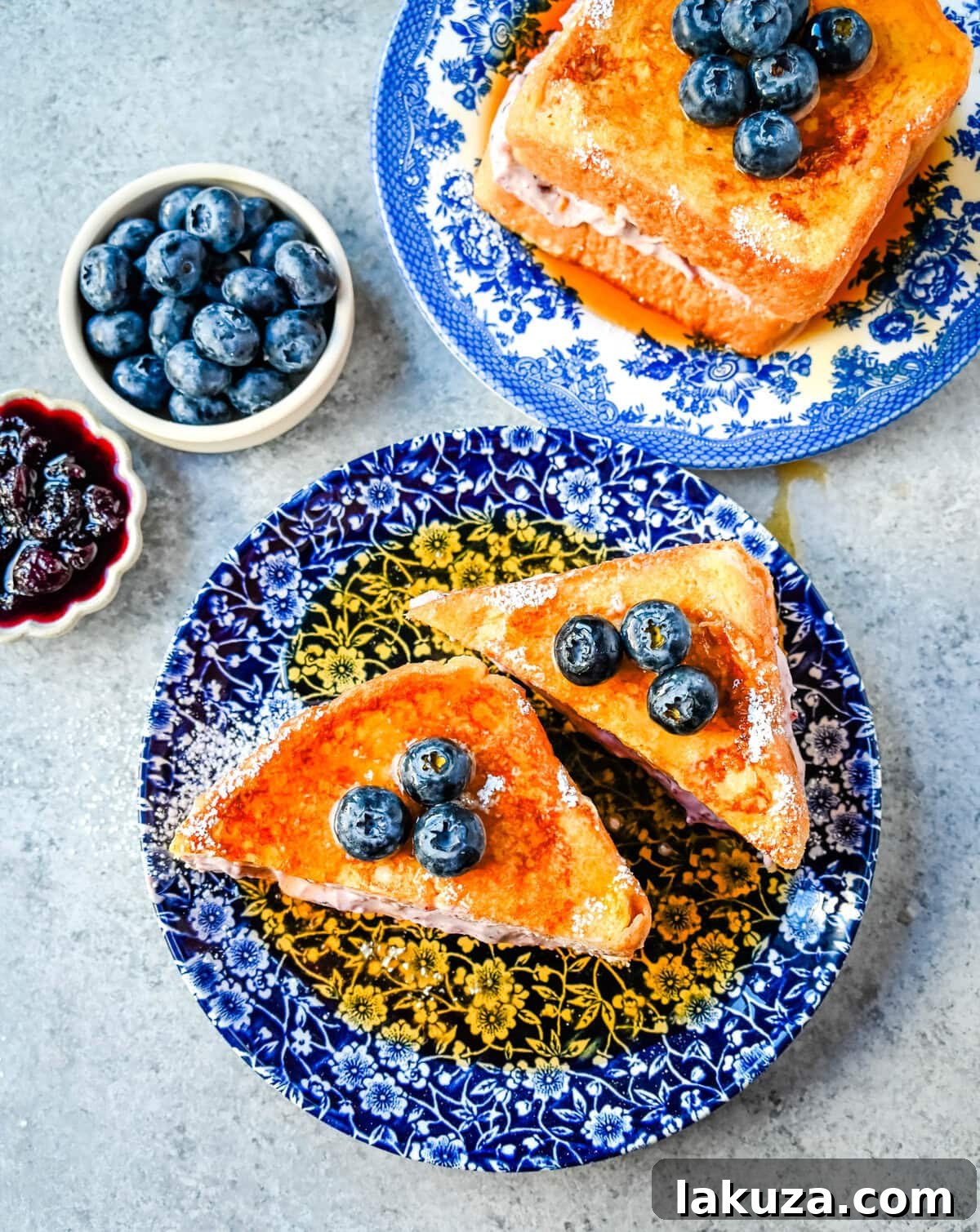 Decadent Blueberry Cheesecake French Toast 3 Close-up of golden brown Blueberry Cheesecake Stuffed French Toast ready to be served.
