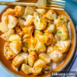Kerrys Legendary Potatoes 7 A mouth-watering image of Kerry's Special Potatoes, a creamy, cheesy, and savory side dish perfect for any family dinner or holiday table.