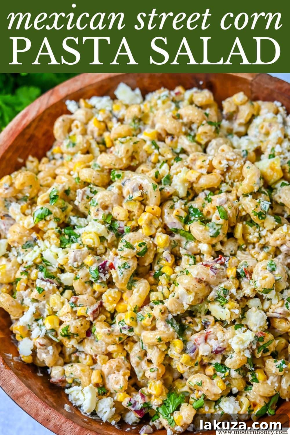 This Mexican Street Corn Pasta Salad is made with fresh corn, pasta, red onion, jalapeno, fresh cilantro, all tossed in a perfectly spiced dressing and topped with cotija cheese, Mexican spices, and fresh lime. It’s street food meets comfort food and it is so addictive. Perfect for a summer BBQ, potluck dish, or the perfect side dish, this Mexican Street Corn Pasta Salad delivers every time.